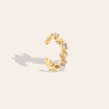 Viele Muscheln mit blauer Zirkonia Vergoldete Ear-Cuffs